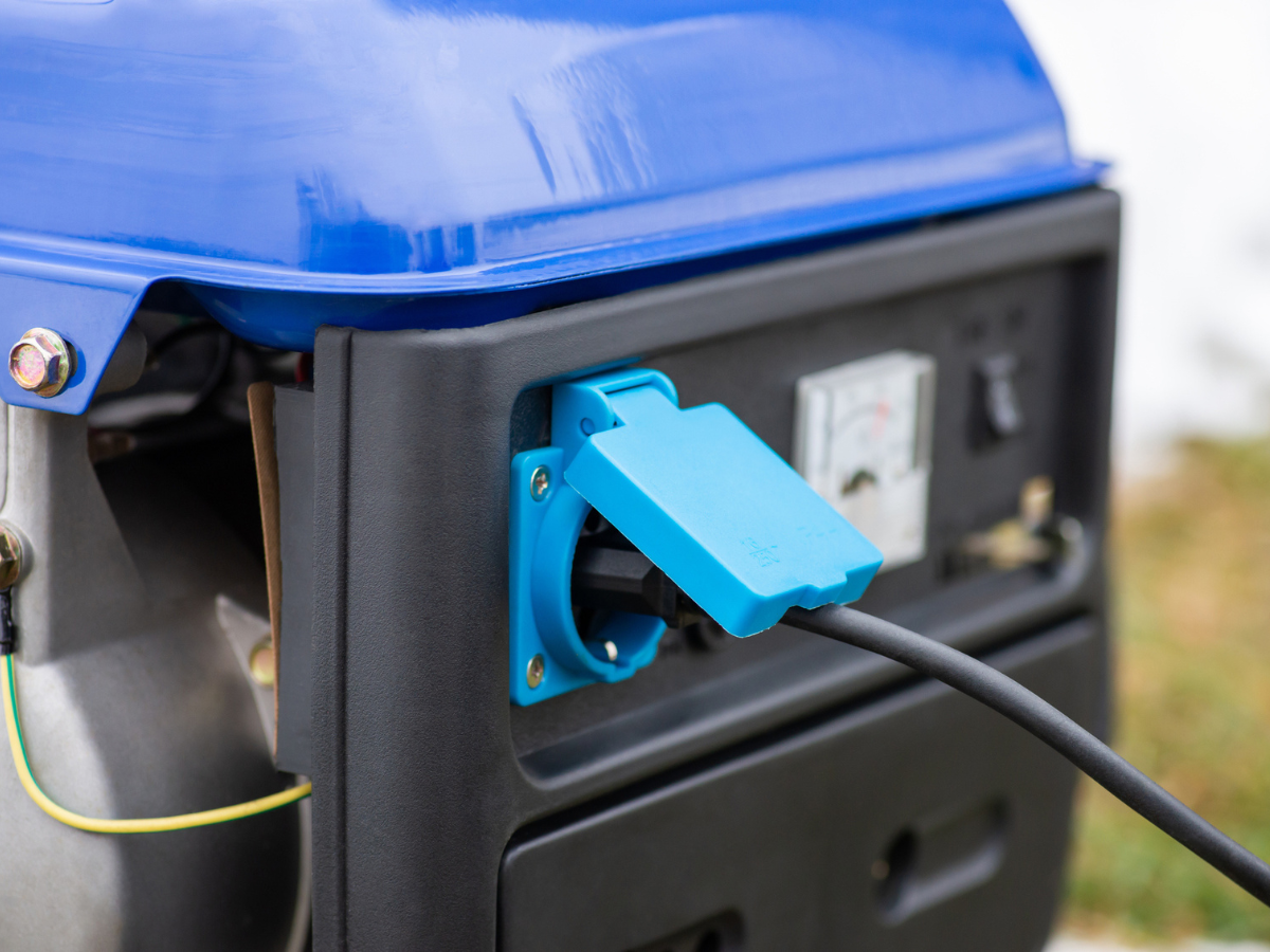 Portable generator powering essential equipment at a Cabin and Cottage during an emergency outage.