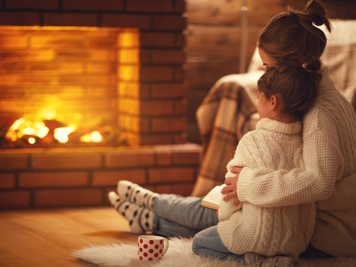 Cozy family gathering beside a warm Fireplace in a rustic living room