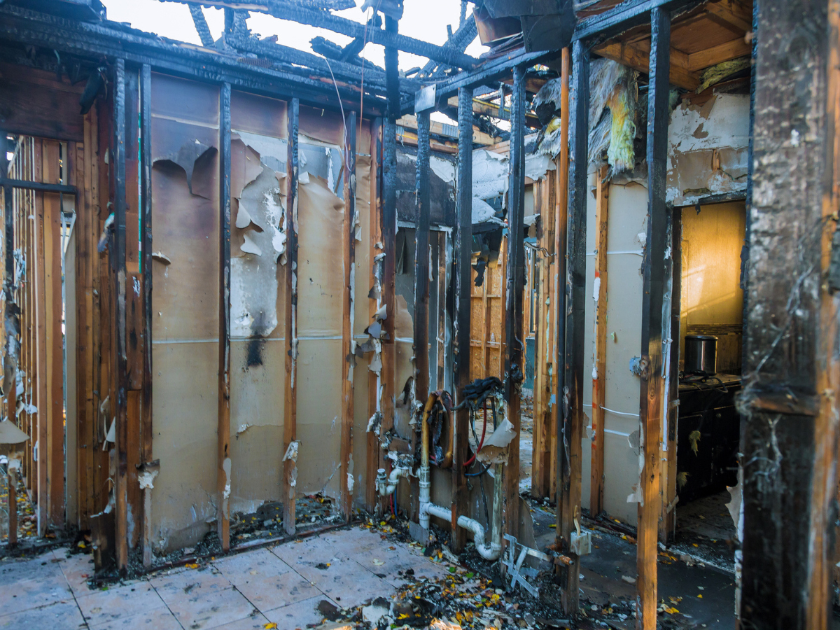 Severely damaged home interior showing extensive Fire Damage after a residential blaze