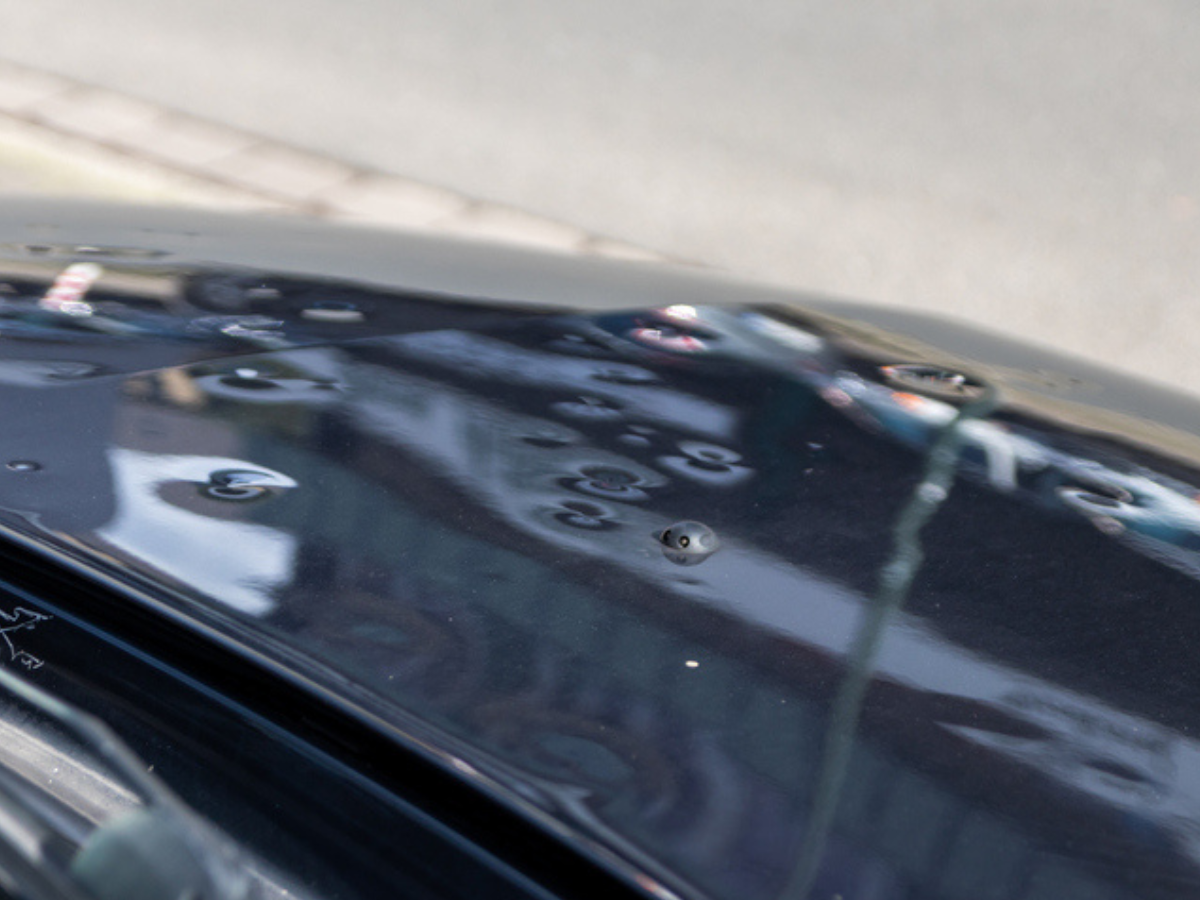 Hail damage on car
