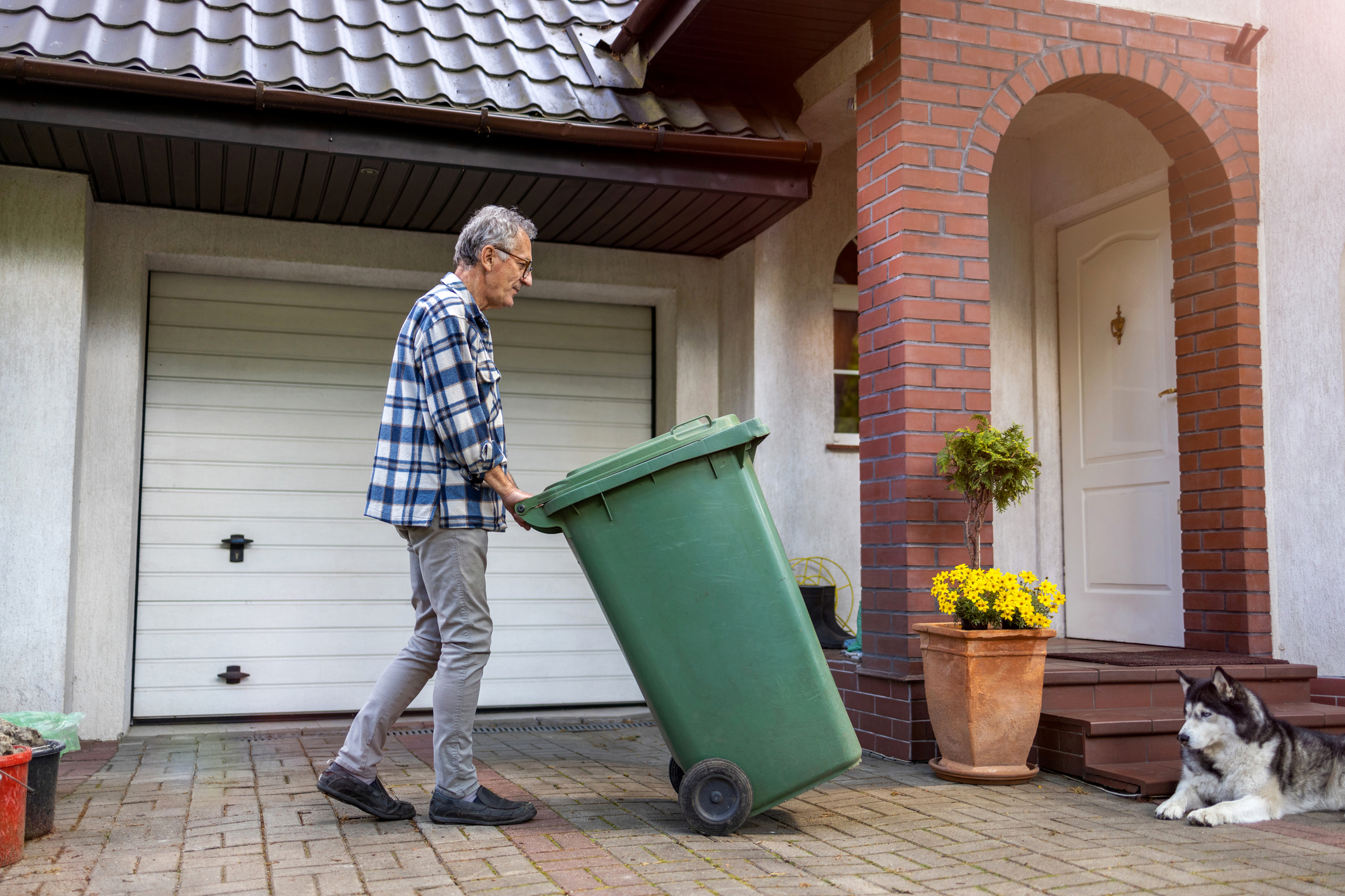 Man picking up garbage