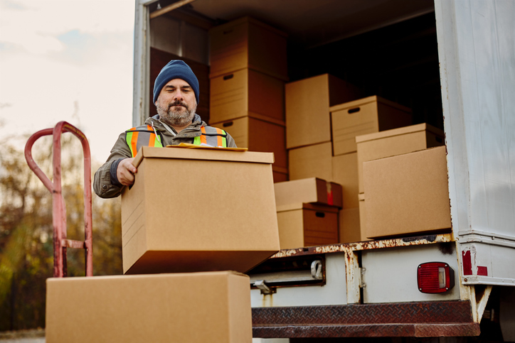 Moving company helping a renter move into a new place