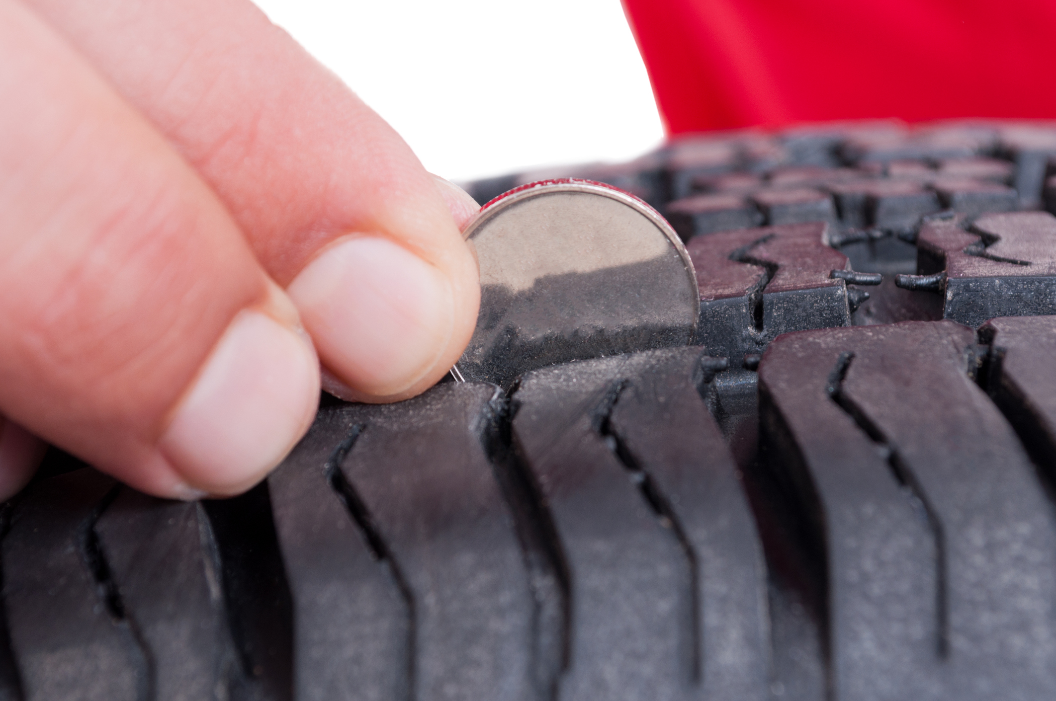 Coin trick to test tire tread