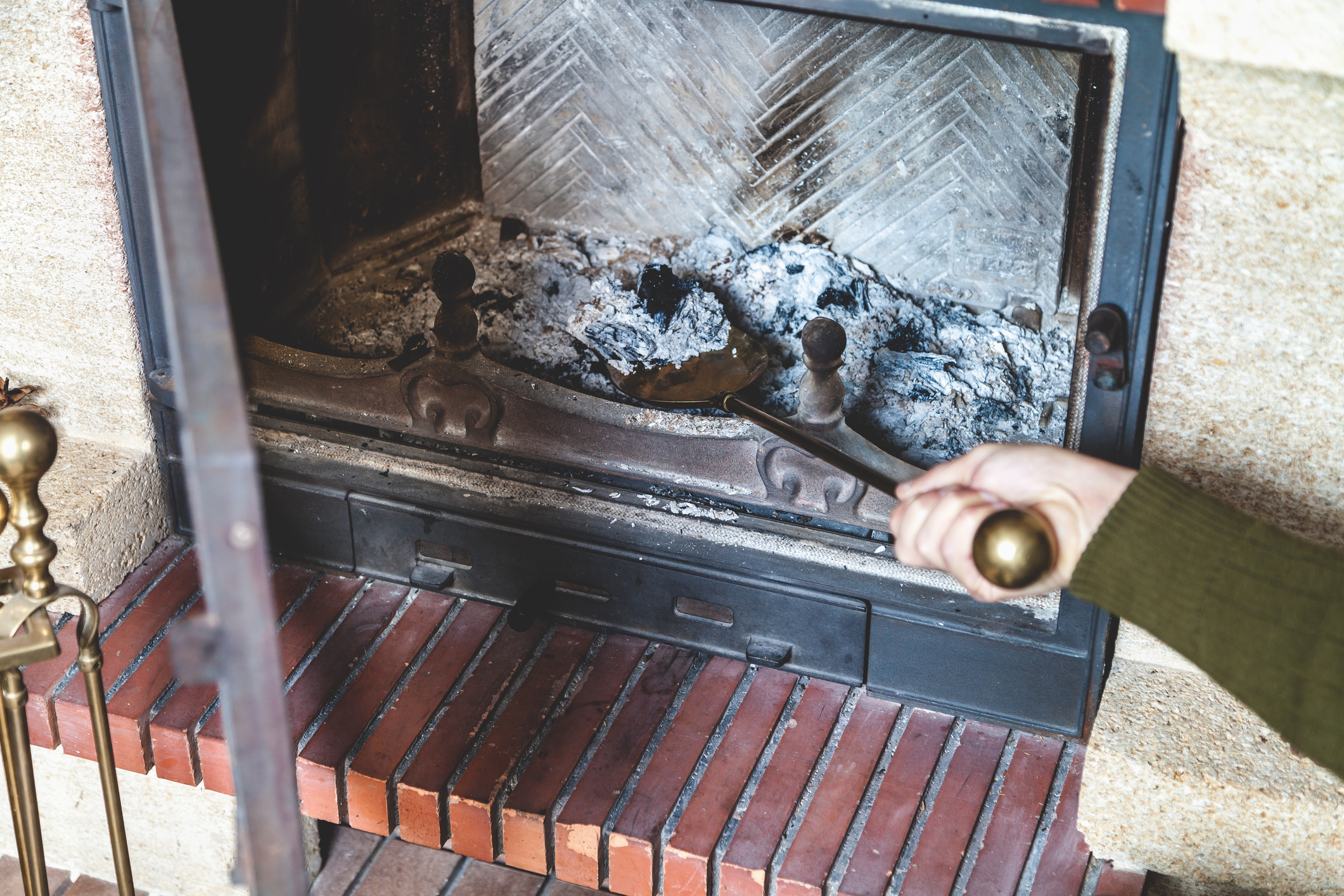 Cleaning ash in fireplace