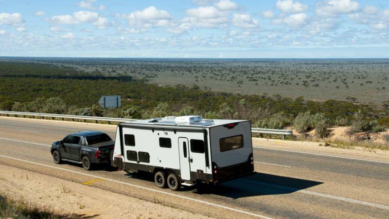 truck pulling trailer with sandbox insurance