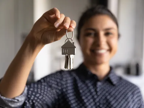 Happy woman ready to move into new home
